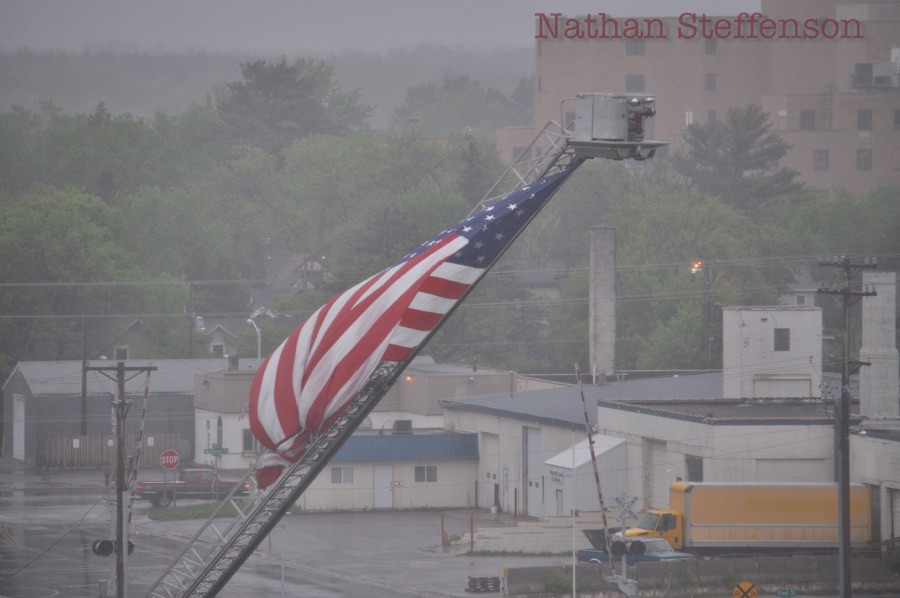 American flag, Essentia Health St. Joseph MC in background