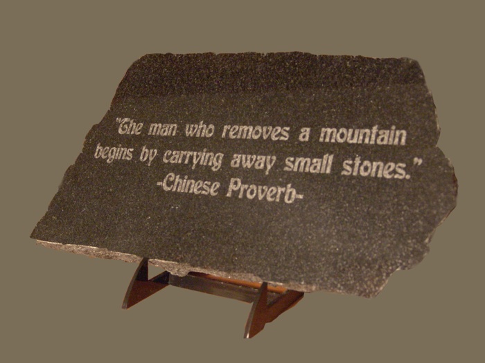 the man who moves a mountain begins by carrying away small stones